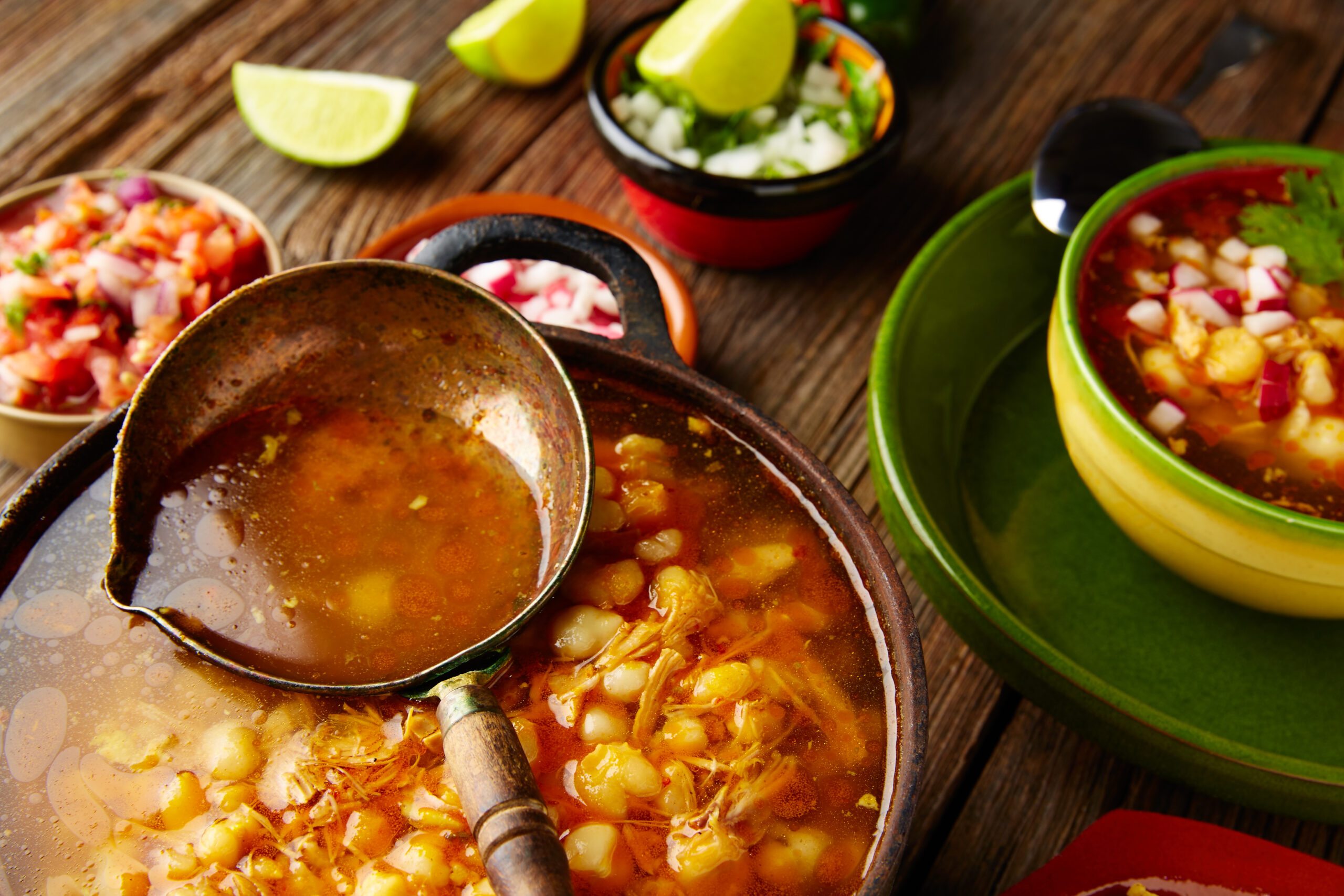 Pozole with mote big corn stew from Mexico in cooking pot